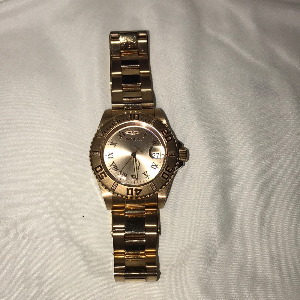Rose gold invicta watch